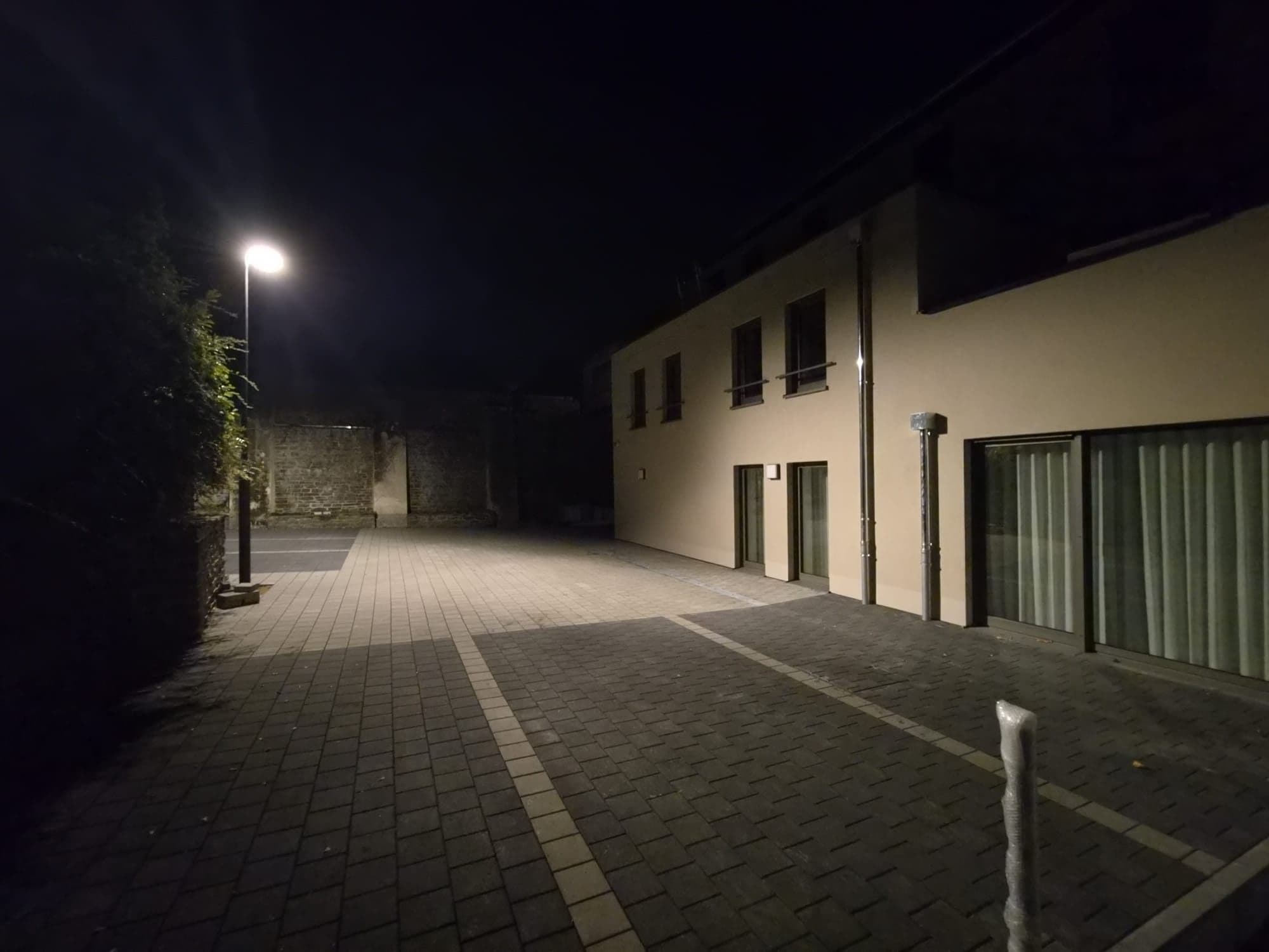 Courtyard of the building lit at night